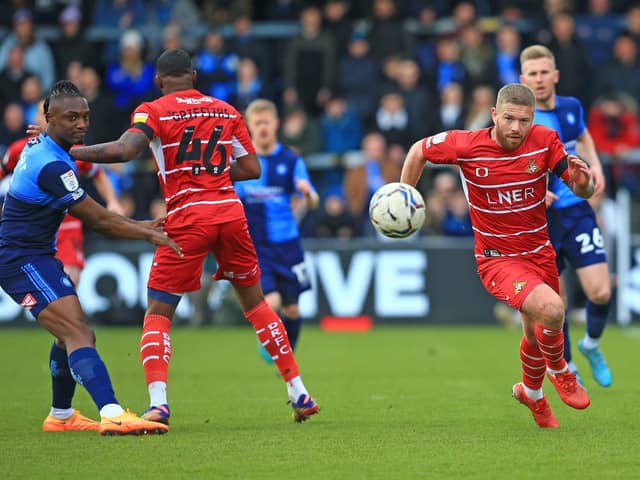 Adam Clayton bursts forward against Wycombe. Picture: Gareth Williams/AHPIX LTD