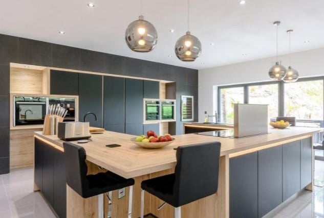 Modern and stylish, the bespoke fitted kitchen features appliances of the highest standard and provides plenty of space for family dining and entertaining.