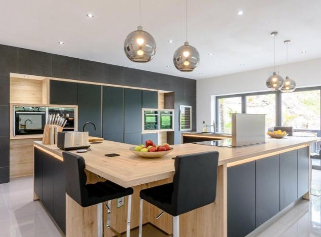 Modern and stylish, the bespoke fitted kitchen features appliances of the highest standard and provides plenty of space for family dining and entertaining.