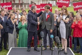 Newly elected Labour MP Keir Mather (centre), with Labour leader Sir Keir Starmer and deputy Labour Party leader Angela Rayner at Selby football club, North Yorkshire. PIC: Danny Lawson/PA Wire