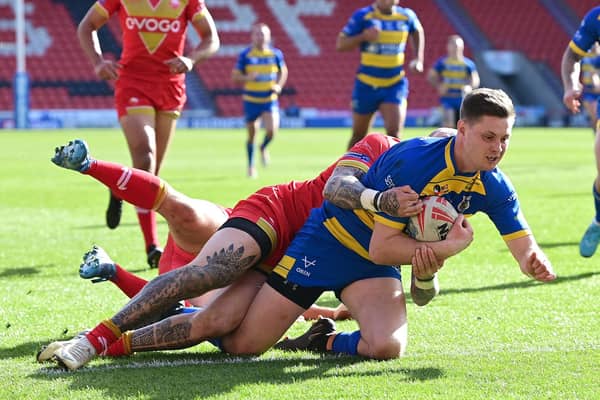 Josh Guzdek scores for the Dons. Picture: Andrew Roe/AHPIX LTD