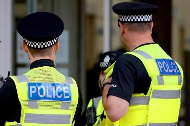 Sheffield Crown Court has heard how a handcuffed South Yorkshire escapee was detained with help of an off-duty police officer during a town centre night-out