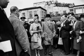Queen Elizabeth II walking in the paddock of Doncaster Racecourse on September 13, 1952.