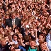 Retiring Saltersgate school head Mike Lynes surrounded by his pupils in July 1996