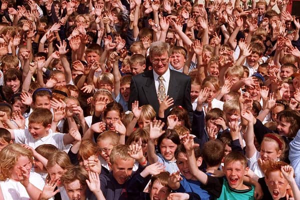 Retiring Saltersgate school head Mike Lynes surrounded by his pupils in July 1996