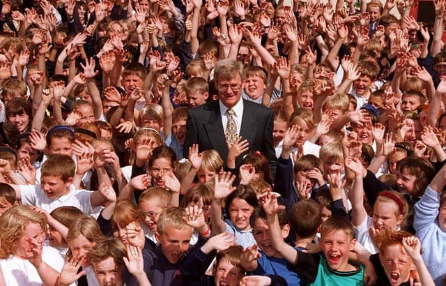 Retiring Saltersgate school head Mike Lynes surrounded by his pupils in July 1996