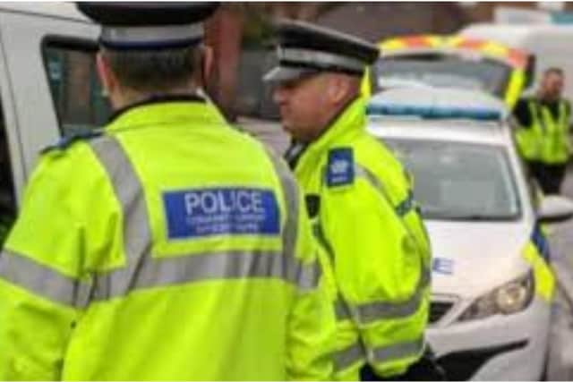 Man on loose with "knife" arrested after attacking police officer in ...