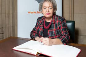 Rosie Winterton MP signs the Holocaust Book of Commitment.