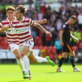 Doncaster's Kyle Hurst celebrates his second goal of the day.