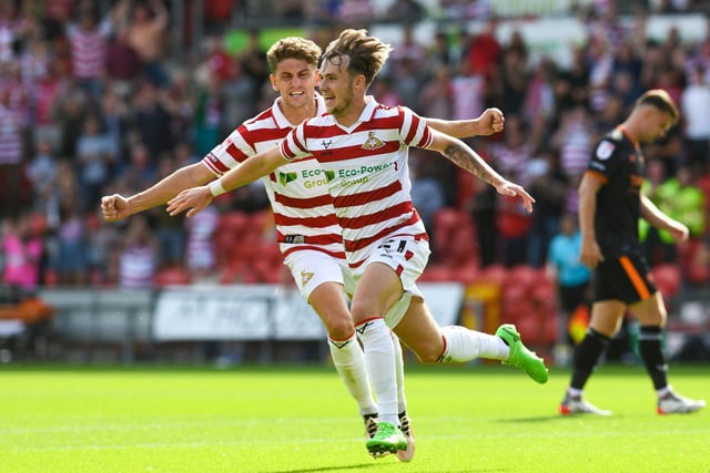 Doncaster's Kyle Hurst celebrates his second goal of the day.