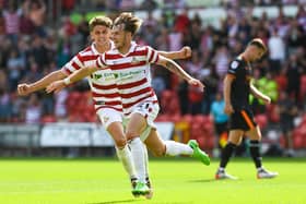 Doncaster's Kyle Hurst celebrates his second goal of the day.
