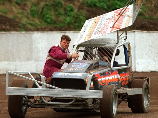 Stock Car racing was Under Starters Orders again at Owlerton Stadium in 1998, and The Star's Driving Correspondent Adrian Taylor fitted into a car to try it out,with the help of Driver Frankie Wainman