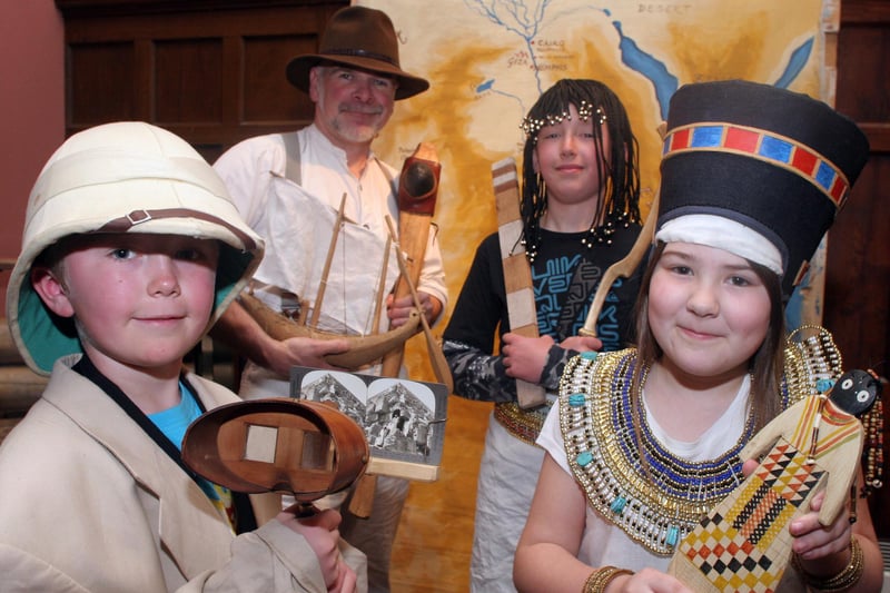 Egyptian explorers at chesterfield museum. 8 year old Alex McBain, David Cadle the history man, 11 year old Fraser McBain and 10 year old Lauren Jones pictured in 2010