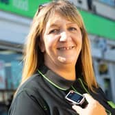 A colleague with one of the body camera's being rolled out to more stores at Central England Co-op