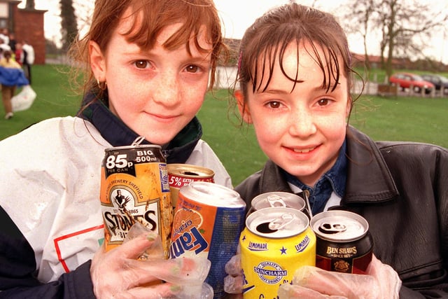 Litter-pickers Becky Stephenson, aged ten, and Kaylee Daniels, aged nine, are pictured with just a small amount of the rubbish they gathered up at Sandall Park in 1998