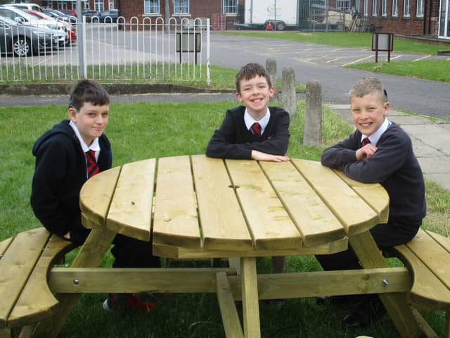 Pupils at Doncaster School for the Deaf enjoy the new benches