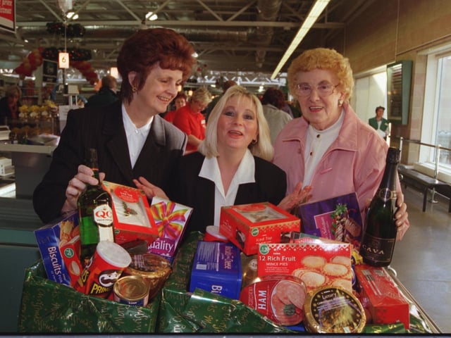 Doncaster Asda customer service manager Dawn Etheridge presented hamper winners Joan Roope (right) of Barnsley Dun, and Pam Noble, of Edenthorpe, with their prizes in 1999