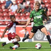 George Miller goes through on goal against Northampton Town.