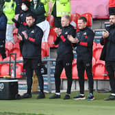 Gary McSheffrey, centre, and his backroom staff.