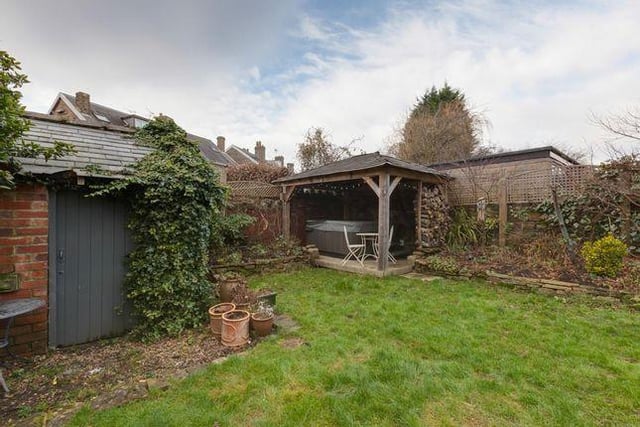 Offers in the region of £599,999 are being invited for this five-bedroom semi-detached property in Dore. To one corner of the garden, there’s a timber built pergola, which is currently used as a shelter for a hot tub. (https://www.zoopla.co.uk/for-sale/details/53899929)