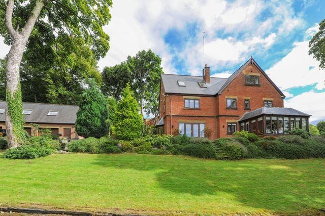 This seven bedroom house has a conservatory with far reaching views.