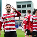 Luke Molyneux celebrates his treble. Pic: Howard Roe.