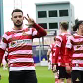 Luke Molyneux celebrates his treble. Pic: Howard Roe.