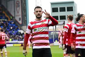 Luke Molyneux celebrates his treble. Pic: Howard Roe.