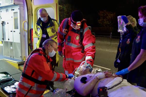 Andrew Stewart being treated at the scene of his accident