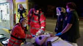 Andrew Stewart being treated at the scene of his accident