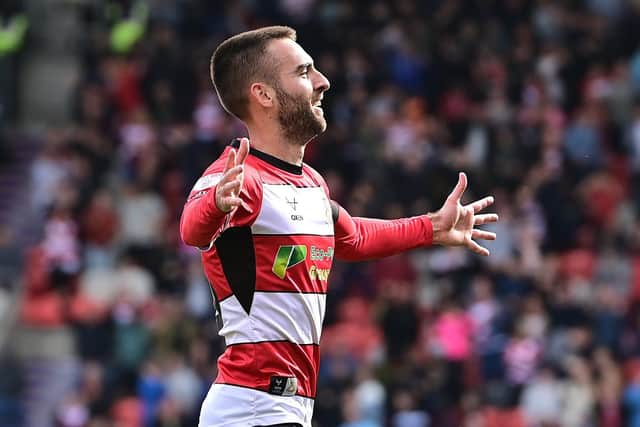 Ben Close celebrates his goal for Doncaster Rovers against Gillingham.