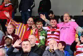 Rob Street hit a first-half brace to secure the League Two title for Doncaster Rovers on the final day of the season to the delight of these fans.
