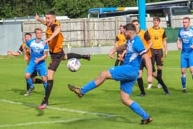 Action from Armthorpe Welfare's FA Vase clash at New Mills. Photo: Steve Pennock