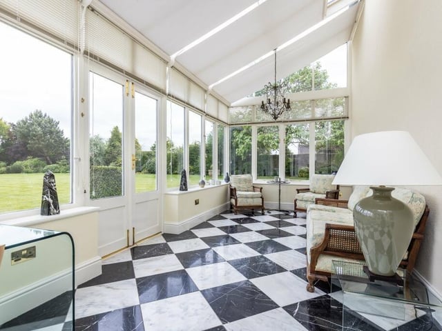 This garden room looks out across the lawned gardens.