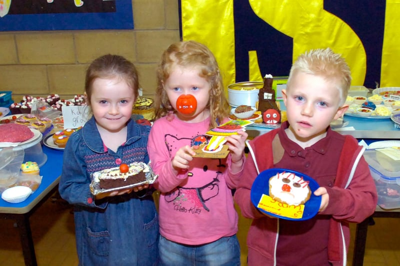 Children at Intake Primary School had been busy making cakes as part of a bake-off for Red Nose Day 2013. Winners from the foundation class with their cakes, from left, Daisy Devine, Isabelle Allott and James Wasteney