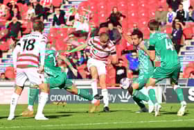 George Miller has a very rare attempt on goal. Picture: Howard Roe/AHPIX LTD