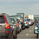 A bus carrying football fans overturned on the A1 near Doncaster, with reports of multiple casualties.