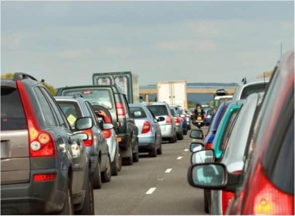 A bus carrying football fans overturned on the A1 near Doncaster, with reports of multiple casualties.