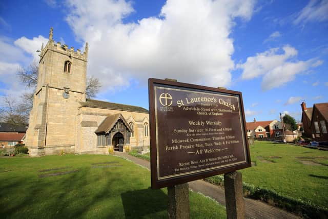 Outside St Laurence's Church in Adwick-Le-Street which houses the tomb of James Washington in the chapel.