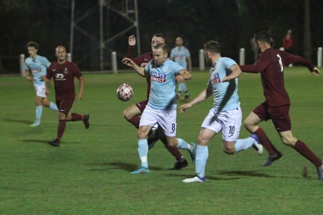 Action from Doncaster City's first ever competitive fixture. Photo: Steve Pennock