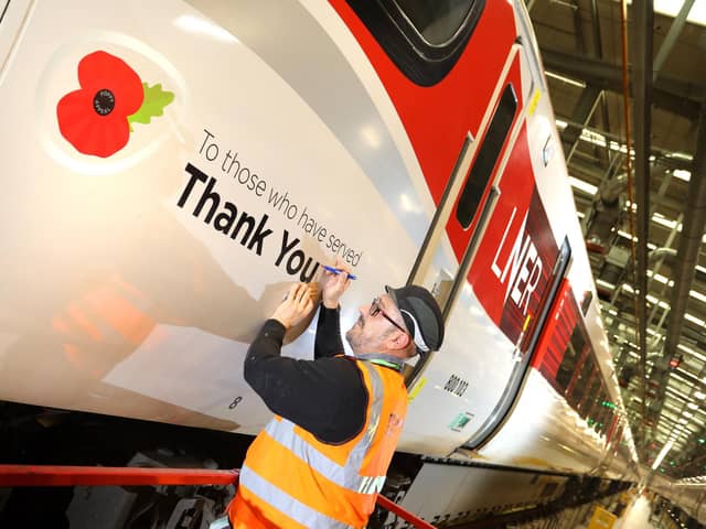 LNER Azuma (800 103) proudly displaying ‘Thank You to those who have served’ at Doncaster works.
800 103 is a 9-coach bi-mode Azuma train. It was introduced into service with the special remembrance design from Saturday 5th November 2022.