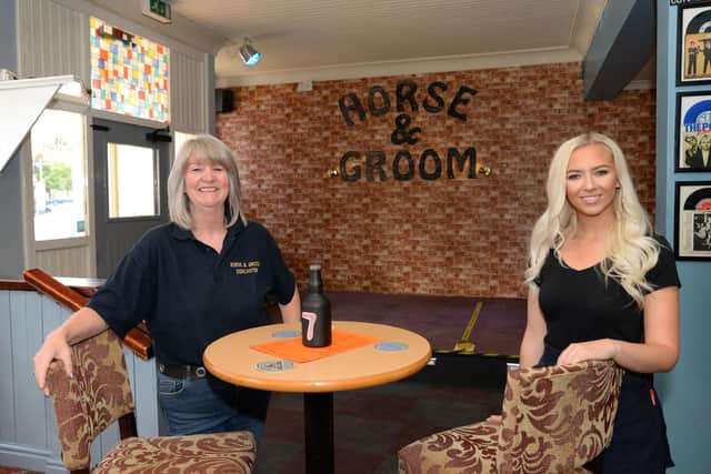 Landlady Ailene Horrocks and Amelia Davey, Bar staff member, pictured by the stage. Picture: NDFP-22-09-20-Horse&Groom 2-NMSY