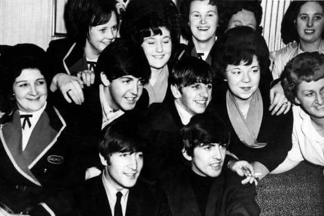 The Beatles backstage at The Gaumont with fans.