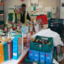 Roger and Alan at the foodbank warehouse.
