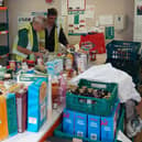 Roger and Alan at the foodbank warehouse.