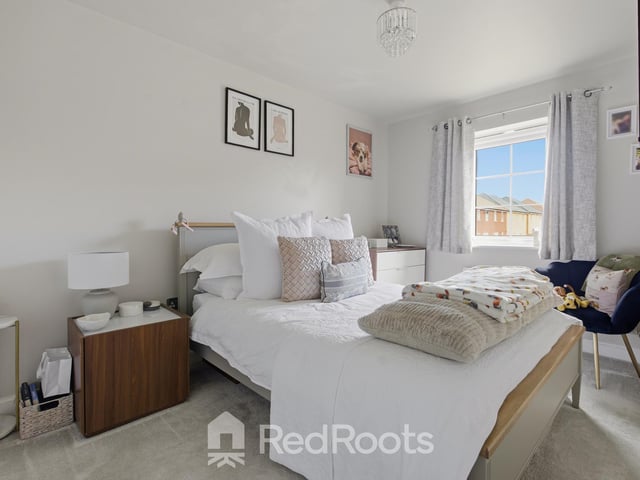 One of the three bedrooms.