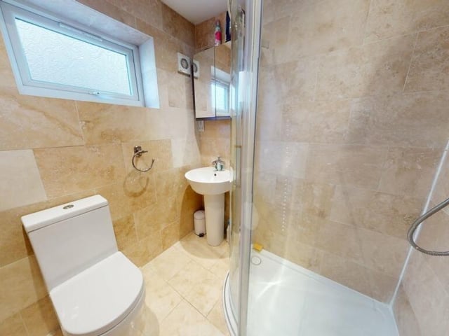 There's a separate shower room, along with the house bathroom.