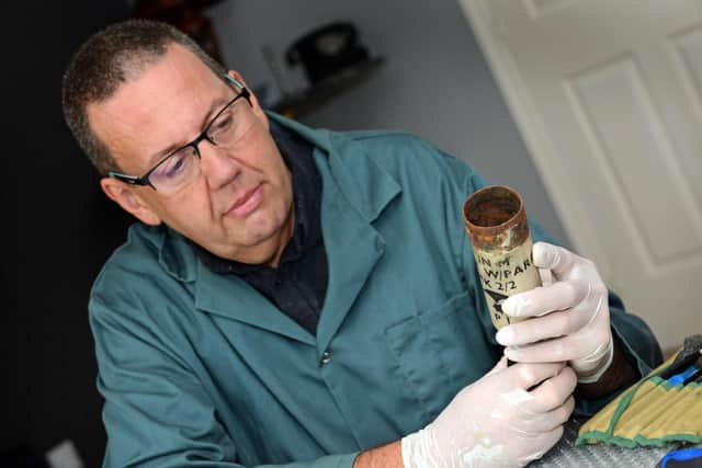 Graham Key, pictured with a Flare Casing he is conserving for a client. Picture: NDFP-15-09-20-Key 2-NMSY