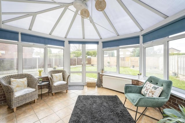 Conservatory 12' 9" x 11' 9" ( 3.89m x 3.58m ) With rear and side facing double glazed windows and French doors giving access to the patio and garden beyond. There is a tiled floor and two central heating radiators.
