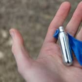 Laughing gas comes in canisters like this.